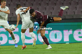 2024-08-12 - Ales Mateju of Spezia Calcio competes for the ball with Flavius Daniliuc of US Salernitana 1919 during the Soccer Italian Cup Freccia Rossa between US Salernitana 1919 vs Spezia Calcio at Arechi Stadium - US SALERNITANA VS SPEZIA CALCIO - ITALIAN CUP - SOCCER