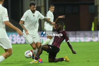 2024-08-12 - Salvatore Elia of Spezia Calcio competes for the ball with \during the Soccer Italian Cup Freccia Rossa between US Salernitana 1919 vs Spezia Calcio at Arechi Stadium - US SALERNITANA VS SPEZIA CALCIO - ITALIAN CUP - SOCCER