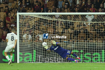 2024-08-12 - Luigi Sepe of US Salernitana 1919 saves the penalty kick during the Soccer Italian Cup Freccia Rossa between US Salernitana 1919 vs Spezia Calcio at Arechi Stadium - US SALERNITANA VS SPEZIA CALCIO - ITALIAN CUP - SOCCER