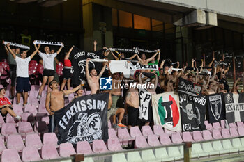 2024-08-12 - the Spezia fans during the Soccer Italian Cup Freccia Rossa between US Salernitana 1919 vs Spezia Calcio at Arechi Stadium - US SALERNITANA VS SPEZIA CALCIO - ITALIAN CUP - SOCCER