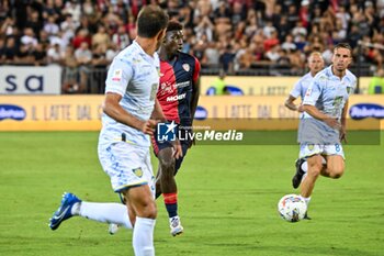 2024-08-12 - Michel Adopo of Cagliari Calcio - CAGLIARI CALCIO VS CARRARESE CALCIO - ITALIAN CUP - SOCCER