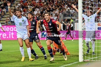 2024-08-12 - Matteo Prati of Cagliari Calcio, Esultanza, Joy After scoring goal, - CAGLIARI CALCIO VS CARRARESE CALCIO - ITALIAN CUP - SOCCER