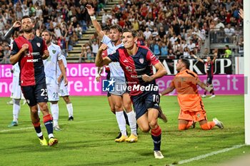 2024-08-12 - Matteo Prati of Cagliari Calcio, Esultanza, Joy After scoring goal, - CAGLIARI CALCIO VS CARRARESE CALCIO - ITALIAN CUP - SOCCER