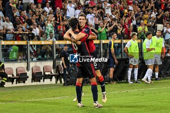 2024-08-12 - Matteo Prati of Cagliari Calcio, Sebastiano Luperto of Cagliari Calcio, Esultanza, Joy After scoring goal, - CAGLIARI CALCIO VS CARRARESE CALCIO - ITALIAN CUP - SOCCER