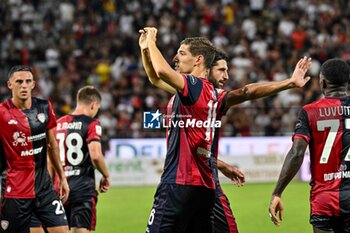 2024-08-12 - Matteo Prati of Cagliari Calcio,Esultanza, Joy After scoring goal, - CAGLIARI CALCIO VS CARRARESE CALCIO - ITALIAN CUP - SOCCER