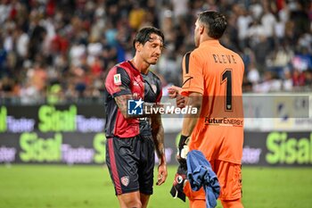 2024-08-12 - Gianluca Lapadula of Cagliari Calcio, Marco Bleve of Carrarese Calcio 1908 - CAGLIARI CALCIO VS CARRARESE CALCIO - ITALIAN CUP - SOCCER