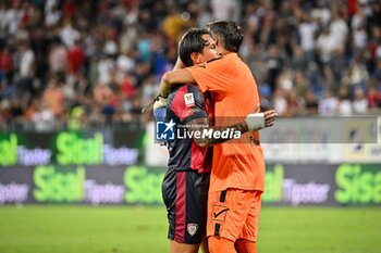 2024-08-12 - Gianluca Lapadula of Cagliari Calcio, Marco Bleve of Carrarese Calcio 1908 - CAGLIARI CALCIO VS CARRARESE CALCIO - ITALIAN CUP - SOCCER