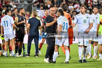 2024-08-12 - Antonio Calabro Mister of Carrarese Calcio 1908, Nicolas Schiavi of Carrarese Calcio 1908 - CAGLIARI CALCIO VS CARRARESE CALCIO - ITALIAN CUP - SOCCER