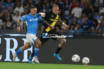 2024-08-10 - Matteo Politano of SSC Napoli competes for the ball with Antonio Pergreffi of Modena FC during the Soccer Italian Cup Freccia Rossa between SSC Napoli vs Modena FC at Diego Armando Maradona Stadium - SSC NAPOLI VS MODENA FC - ITALIAN CUP - SOCCER