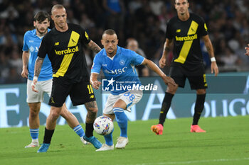 2024-08-10 - Stanislav Lobotka of SSC Napoli competes for the ball with Antonio Palumbo of Modena FC during the Soccer Italian Cup Freccia Rossa between SSC Napoli vs Modena FC at Diego Armando Maradona Stadium - SSC NAPOLI VS MODENA FC - ITALIAN CUP - SOCCER