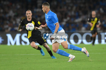 2024-08-10 - Alessandro Buongiorno of SSC Napoli competes for the ball with Antonio Palumbo of Modena FC during the Soccer Italian Cup Freccia Rossa between SSC Napoli vs Modena FC at Diego Armando Maradona Stadium - SSC NAPOLI VS MODENA FC - ITALIAN CUP - SOCCER