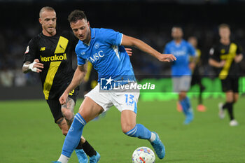 2024-08-10 - Amir Rrahmani of SSC Napoli competes for the ball with Antonio Palumbo of Modena FC during the Soccer Italian Cup Freccia Rossa between SSC Napoli vs Modena FC at Diego Armando Maradona Stadium - SSC NAPOLI VS MODENA FC - ITALIAN CUP - SOCCER