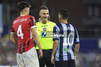 2024-08-10 - Gianluca Renzi of Pesaro, referee, Nicolo Buso (Lecco) and Davide Bartesaghi (Milan Futuro) during the Serie C Now Cup match between Lecco and Milan Futuro at Stadio Mario Rigamonti-Mario Ceppi on August 10, 2024 in Lecco, Italy.
(Photo by Matteo Bonacina/LiveMedia) - LECCO VS MILAN FUTURO - ITALIAN CUP - SOCCER