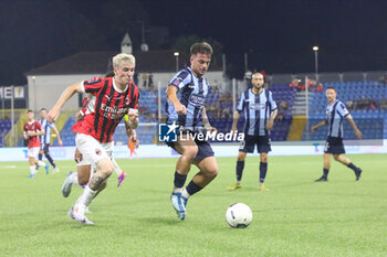 2024-08-10 - Alejandro Sanchez Jimenez (Milan Futuro) and Mattia Tordini (Lecco) during the Serie C Now Cup match between Lecco and Milan Futuro at Stadio Mario Rigamonti-Mario Ceppi on August 10, 2024 in Lecco, Italy.
(Photo by Matteo Bonacina/LiveMedia) - LECCO VS MILAN FUTURO - ITALIAN CUP - SOCCER