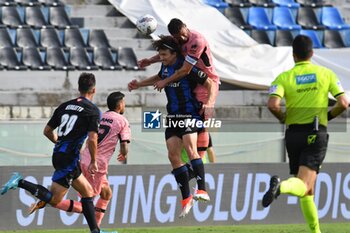 2024-09-25 - Head tackle by Alexander Lind (Pisa) and Giuseppe Prestia (Cesena) - PISA VS CESENA - ITALIAN CUP - SOCCER