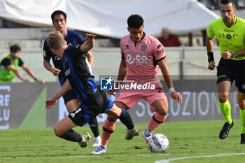 2024-09-25 - Elays Tavsan (Cesena) thwarted by Malthe Hojholt (Pisa) - PISA VS CESENA - ITALIAN CUP - SOCCER