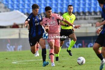 2024-09-25 - Elays Tavsan (Cesena) thwarted by Pietro Beruatto (Pisa) - PISA VS CESENA - ITALIAN CUP - SOCCER