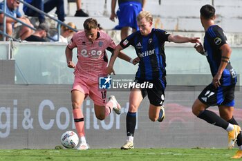 2024-09-25 - Sydney Van Hooijdonk (Cesena) thwarted by Malthe Hojholt (Pisa) - PISA VS CESENA - ITALIAN CUP - SOCCER