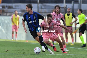 2024-09-25 - Oliver Abildgaard Nielsen (Pisa) thwarted by Matteo Francesconi (Cesena) - PISA VS CESENA - ITALIAN CUP - SOCCER