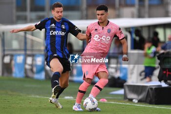 2024-09-25 - Elays Tavsan (Cesena) thwarted by Oliver Abildgaard Nielsen (Pisa) - PISA VS CESENA - ITALIAN CUP - SOCCER