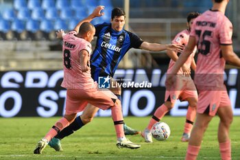 2024-09-25 - Stefano Moreo (Pisa) thwarted by Saber Hraiech (Cesena) - PISA VS CESENA - ITALIAN CUP - SOCCER