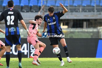 2024-09-25 - Giovanni Bonfanti (Pisa) thwarted by Cristian Shpendi (Cesena) - PISA VS CESENA - ITALIAN CUP - SOCCER