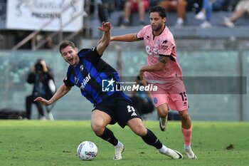 2024-09-25 - Oliver Abildgaard Nielsen (Pisa) thwarted by Andrea Ciofi (Cesena) - PISA VS CESENA - ITALIAN CUP - SOCCER