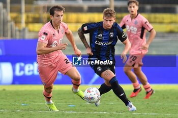 2024-09-25 - Nicholas Bonfanti (Pisa) thwarted by Massimiliano Mangraviti (Cesena) - PISA VS CESENA - ITALIAN CUP - SOCCER