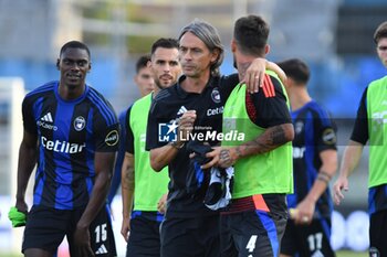 2024-09-25 - Head coach of Pisa Filippo Inzaghi and Antonio Caracciolo (Pisa) at the end of the match - PISA VS CESENA - ITALIAN CUP - SOCCER