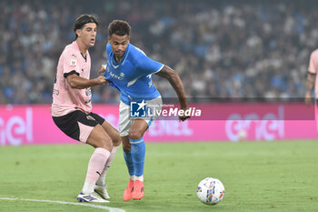 2024-09-26 - Pietro Ceccaroni of Palermo FC competes for the ball with Cyril Ngonge of SSC Napoli during the Soccer Italian Cup Freccia Rossa between SSC Napoli vs Palermo FC at Diego Armando Maradona Stadium - NAPOLI VS PALERMO - ITALIAN CUP - SOCCER