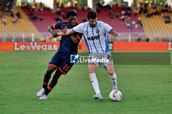 2024-09-24 - Patrick Dorgu of US Lecce in action against Fabrizio Caligara of US Sassuolo - LECCE VS SASSUOLO - ITALIAN CUP - SOCCER