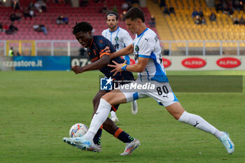 2024-09-24 - Patrick Dorgu of US Lecce in action against Tarik Muharemovic of US Sassuolo - LECCE VS SASSUOLO - ITALIAN CUP - SOCCER