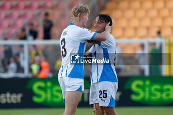 2024-09-24 - Lua D'Andrea of US Sassuolo and Josh Doig of US Sassuolo celebrates the victory - LECCE VS SASSUOLO - ITALIAN CUP - SOCCER