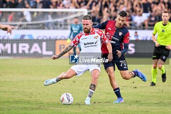 2024-09-24 - Zan Majer of US Cremonese, Gianluca Gaetano of Cagliari Calcio - CAGLIARI VS CREMONESE - ITALIAN CUP - SOCCER