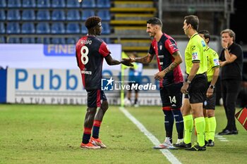 2024-09-24 - Michel Adopo of Cagliari Calcio, Alessandro Deiola of Cagliari Calcio - CAGLIARI VS CREMONESE - ITALIAN CUP - SOCCER