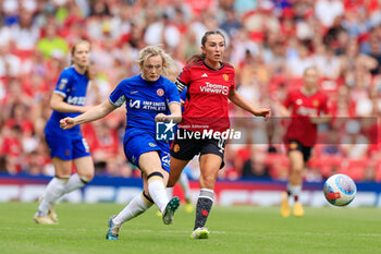 2024-05-18 - Erin Cuthbert (22) of Chelsea and Katie Zelem (10) of Manchester United during the FA Women's Super League, English championship football match between Manchester United and Chelsea on 18 May 2024 at Old Trafford in Manchester, England - FOOTBALL - WOMEN'S ENGLISH CHAMP - MANCHESTER UNITED V CHELSEA - ENGLISH FA WOMEN'S SUPER LEAGUE - SOCCER