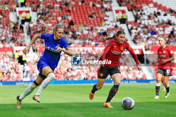 2024-05-18 - Nathalie Bjorn (39) of Chelsea and Hannah Blundell (6) of Manchester United during the FA Women's Super League, English championship football match between Manchester United and Chelsea on 18 May 2024 at Old Trafford in Manchester, England - FOOTBALL - WOMEN'S ENGLISH CHAMP - MANCHESTER UNITED V CHELSEA - ENGLISH FA WOMEN'S SUPER LEAGUE - SOCCER