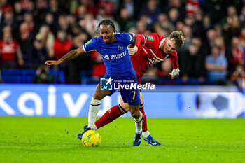 2024-01-23 - Raheem Sterling (7) of Chelsea and Rav van den Berg (3) of Middlesbrough during the English League Cup, EFL Cup, semi final second leg football match between Chelsea and Middlesbrough on 23 January 2024 at Stamford Bridge in London, England - FOOTBALL - ENGLISH LEAGUE CUP - CHELSEA V MIDDLESBROUGH - ENGLISH LEAGUE CUP - SOCCER