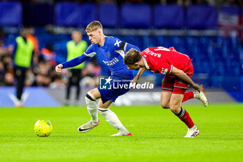 2024-01-23 - Cole Palmer (20) of Chelsea and Dan Barlaser (4) of Middlesbrough during the English League Cup, EFL Cup, semi final second leg football match between Chelsea and Middlesbrough on 23 January 2024 at Stamford Bridge in London, England - FOOTBALL - ENGLISH LEAGUE CUP - CHELSEA V MIDDLESBROUGH - ENGLISH LEAGUE CUP - SOCCER