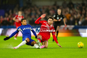 2024-01-23 - Thiago Silva (6) of Chelsea slides in and tackles Matt Crooks (25) of Middlesbrough during the English League Cup, EFL Cup, semi final second leg football match between Chelsea and Middlesbrough on 23 January 2024 at Stamford Bridge in London, England - FOOTBALL - ENGLISH LEAGUE CUP - CHELSEA V MIDDLESBROUGH - ENGLISH LEAGUE CUP - SOCCER