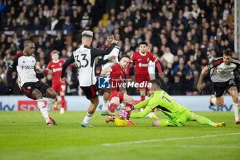 2024-01-24 - Fulham goalkeeper Bernd Leno (17) against Liverpool forward Diogo Jota (20) during the English League Cup, EFL Cup, semi-final second leg football match between Fulham and Liverpool on 24 January 2024 at Craven Cottage in London, England - FOOTBALL - ENGLISH LEAGUE CUP - FULHAM V LIVERPOOL - ENGLISH LEAGUE CUP - SOCCER