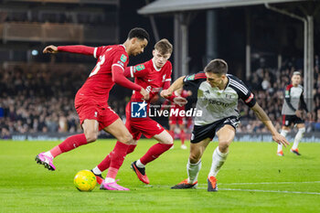 2024-01-24 - Liverpool forward Cody Gakpo (18) and Liverpool defender Conor Bradley (84) against Fulham midfielder Joao Palhinha (26) during the English League Cup, EFL Cup, semi-final second leg football match between Fulham and Liverpool on 24 January 2024 at Craven Cottage in London, England - FOOTBALL - ENGLISH LEAGUE CUP - FULHAM V LIVERPOOL - ENGLISH LEAGUE CUP - SOCCER