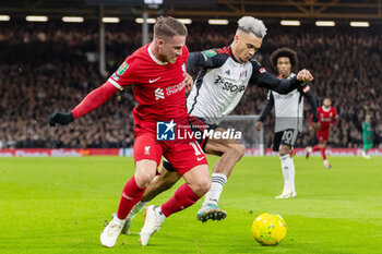 2024-01-24 - Liverpool midfielder Alexis Mac Allister (10) and Fulham midfielder Andreas Pereira (18) during the English League Cup, EFL Cup, semi-final second leg football match between Fulham and Liverpool on 24 January 2024 at Craven Cottage in London, England - FOOTBALL - ENGLISH LEAGUE CUP - FULHAM V LIVERPOOL - ENGLISH LEAGUE CUP - SOCCER