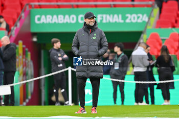 2024-02-25 - Liverpool manager Jurgen Klopp watching the warm up ahead of the English League Cup, EFL Cup, Carabao Cup, Final football match between Chelsea and Liverpool on 25 February 2024 at Wembley Stadium in London, England - FOOTBALL - ENGLISH LEAGUE CUP - FINAL - CHELSEA V LIVERPOOL - ENGLISH LEAGUE CUP - SOCCER