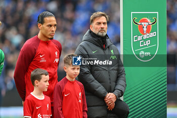 2024-02-25 - Liverpool manager Jurgen Klopp stands with Virgil van Dijk (4) of Liverpool for the National Anthem during the English League Cup, EFL Cup, Carabao Cup, Final football match between Chelsea and Liverpool on 25 February 2024 at Wembley Stadium in London, England - FOOTBALL - ENGLISH LEAGUE CUP - FINAL - CHELSEA V LIVERPOOL - ENGLISH LEAGUE CUP - SOCCER