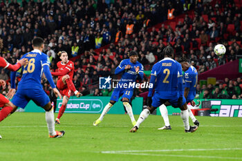 2024-02-25 - Kostas Tsimikas (21) of Liverpool shoots at goal during the English League Cup, EFL Cup, Carabao Cup, Final football match between Chelsea and Liverpool on 25 February 2024 at Wembley Stadium in London, England - FOOTBALL - ENGLISH LEAGUE CUP - FINAL - CHELSEA V LIVERPOOL - ENGLISH LEAGUE CUP - SOCCER