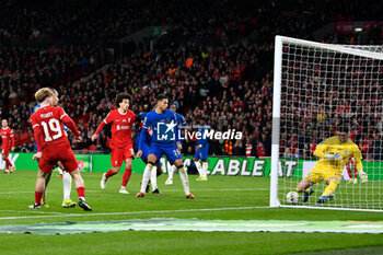 2024-02-25 - Djordje Petrovic (28) of Chelsea makes a save from a shot at goal by Harvey Elliott (19) of Liverpool during the English League Cup, EFL Cup, Carabao Cup, Final football match between Chelsea and Liverpool on 25 February 2024 at Wembley Stadium in London, England - FOOTBALL - ENGLISH LEAGUE CUP - FINAL - CHELSEA V LIVERPOOL - ENGLISH LEAGUE CUP - SOCCER