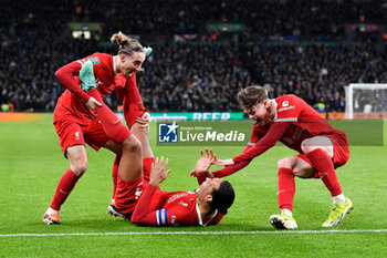 2024-02-25 - Virgil van Dijk (4) of Liverpool celebrates scoring the winning goal with Kostas Tsimikas (21) of Liverpool and James McConnell (53) of Liverpool during the English League Cup, EFL Cup, Carabao Cup, Final football match between Chelsea and Liverpool on 25 February 2024 at Wembley Stadium in London, England - FOOTBALL - ENGLISH LEAGUE CUP - FINAL - CHELSEA V LIVERPOOL - ENGLISH LEAGUE CUP - SOCCER