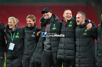 2024-02-25 - Liverpool manager Jurgen Klopp celebrates with his staff after winning the English League Cup, EFL Cup, Carabao Cup, Final football match between Chelsea and Liverpool on 25 February 2024 at Wembley Stadium in London, England - FOOTBALL - ENGLISH LEAGUE CUP - FINAL - CHELSEA V LIVERPOOL - ENGLISH LEAGUE CUP - SOCCER