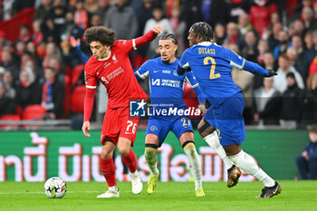 2024-02-25 - Jayden Danns (76) of Liverpool and Malo Gusto (27), Axel Disasi (2) of Chelsea during the English League Cup, EFL Cup, Carabao Cup, Final football match between Chelsea and Liverpool on 25 February 2024 at Wembley Stadium in London, England - FOOTBALL - ENGLISH LEAGUE CUP - FINAL - CHELSEA V LIVERPOOL - ENGLISH LEAGUE CUP - SOCCER